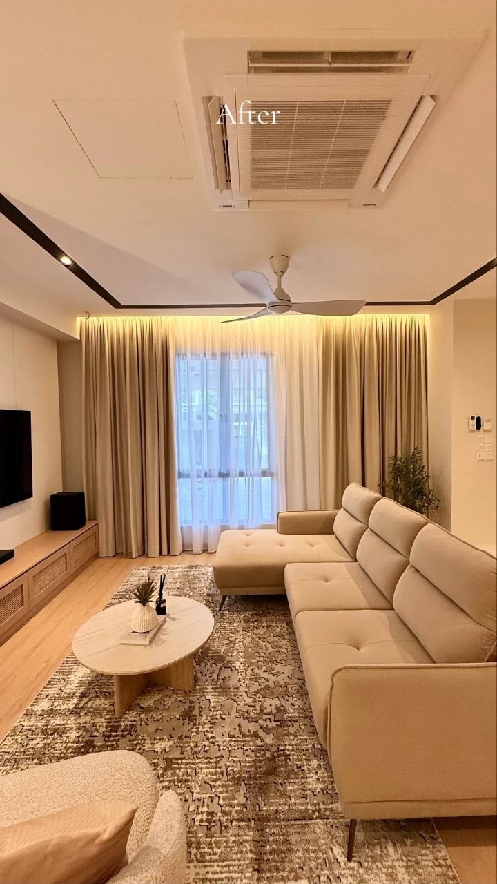 Landed home living area with warm wood TV console, sofa and ceiling fan — view 8